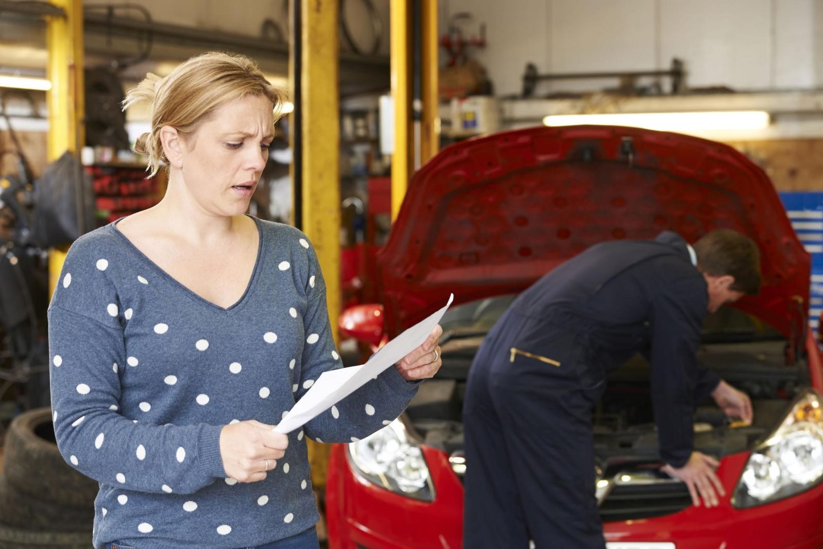 Car owner facing expensive repairs at an auto repair shop
